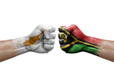 Two hands punch to each others on white background. Country flags painted fists, conflict crisis concept between cyprus and vanuatu