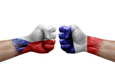 Two hands punch to each others on white background. Country flags painted fists, conflict crisis concept between czechia and france