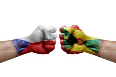 Two hands punch to each others on white background. Country flags painted fists, conflict crisis concept between czechia and grenada
