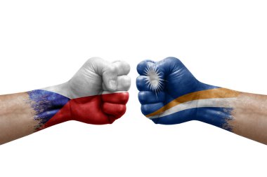 Two hands punch to each others on white background. Country flags painted fists, conflict crisis concept between czechia and marshall islands
