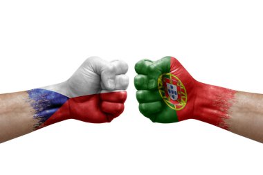 Two hands punch to each others on white background. Country flags painted fists, conflict crisis concept between czechia and portugal