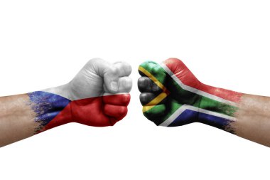 Two hands punch to each others on white background. Country flags painted fists, conflict crisis concept between czechia and south africa