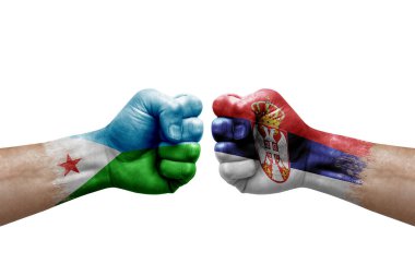 Two hands punch to each others on white background. Country flags painted fists, conflict crisis concept between djibouti and serbia