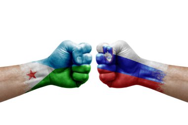 Two hands punch to each others on white background. Country flags painted fists, conflict crisis concept between djibouti and slovenia