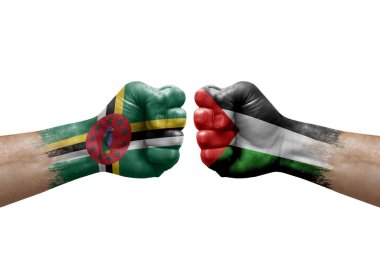 Two hands punch to each others on white background. Country flags painted fists, conflict crisis concept between dominica and palestine