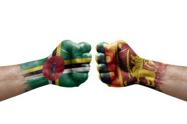 Two hands punch to each others on white background. Country flags painted fists, conflict crisis concept between dominica and sri lanka