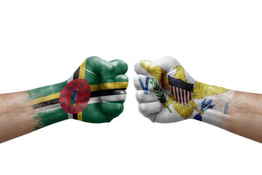Two hands punch to each others on white background. Country flags painted fists, conflict crisis concept between dominica and virgin islands