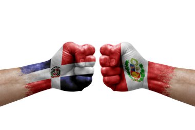 Two hands punch to each others on white background. Country flags painted fists, conflict crisis concept between dominican republic and peru
