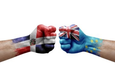 Two hands punch to each others on white background. Country flags painted fists, conflict crisis concept between dominican republic and tuvalu