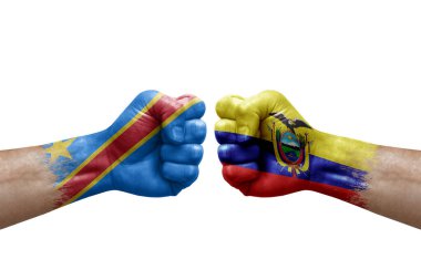Two hands punch to each others on white background. Country flags painted fists, conflict crisis concept between dr congo and ecuador