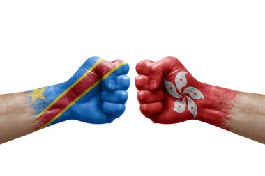 Two hands punch to each others on white background. Country flags painted fists, conflict crisis concept between dr congo and hong kong