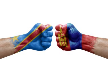Two hands punch to each others on white background. Country flags painted fists, conflict crisis concept between dr congo and mongolia