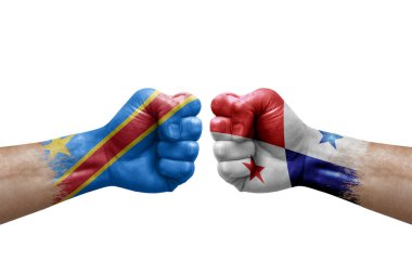Two hands punch to each others on white background. Country flags painted fists, conflict crisis concept between dr congo and panama