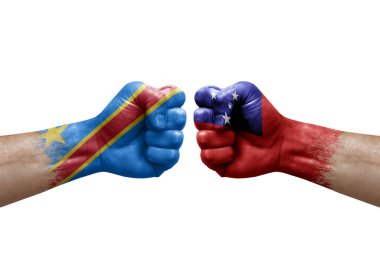 Two hands punch to each others on white background. Country flags painted fists, conflict crisis concept between dr congo and samoa