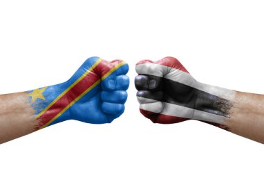 Two hands punch to each others on white background. Country flags painted fists, conflict crisis concept between dr congo and thailand
