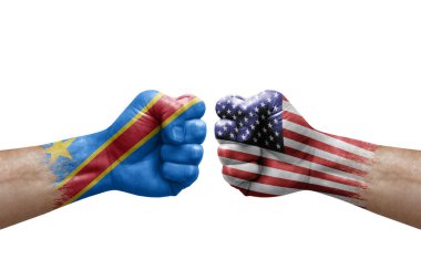 Two hands punch to each others on white background. Country flags painted fists, conflict crisis concept between dr congo and usa