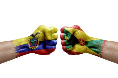 Two hands punch to each others on white background. Country flags painted fists, conflict crisis concept between ecuador and grenada