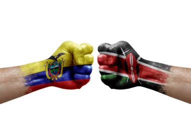 Two hands punch to each others on white background. Country flags painted fists, conflict crisis concept between ecuador and kenya