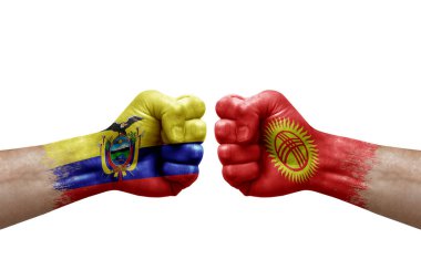 Two hands punch to each others on white background. Country flags painted fists, conflict crisis concept between ecuador and kyrgyzstan
