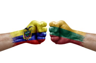 Two hands punch to each others on white background. Country flags painted fists, conflict crisis concept between ecuador and lithuania