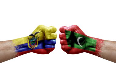 Two hands punch to each others on white background. Country flags painted fists, conflict crisis concept between ecuador and maldives