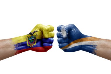 Two hands punch to each others on white background. Country flags painted fists, conflict crisis concept between ecuador and marshall islands