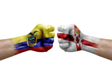 Two hands punch to each others on white background. Country flags painted fists, conflict crisis concept between ecuador and ireland