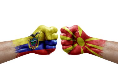 Two hands punch to each others on white background. Country flags painted fists, conflict crisis concept between ecuador and north macedonia