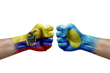 Two hands punch to each others on white background. Country flags painted fists, conflict crisis concept between ecuador and palau