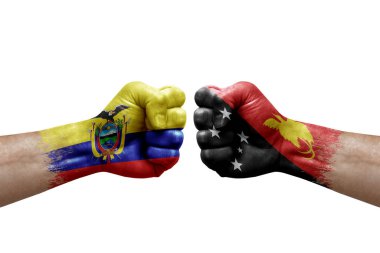 Two hands punch to each others on white background. Country flags painted fists, conflict crisis concept between ecuador and papua new guinea