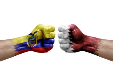 Two hands punch to each others on white background. Country flags painted fists, conflict crisis concept between ecuador and qatar