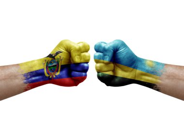 Two hands punch to each others on white background. Country flags painted fists, conflict crisis concept between ecuador and rwanda