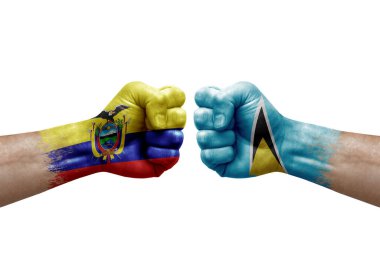 Two hands punch to each others on white background. Country flags painted fists, conflict crisis concept between ecuador and saint lucia