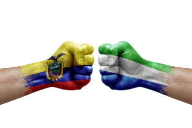Two hands punch to each others on white background. Country flags painted fists, conflict crisis concept between ecuador and sierra leone