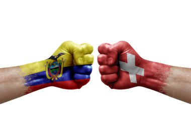 Two hands punch to each others on white background. Country flags painted fists, conflict crisis concept between ecuador and switzerland