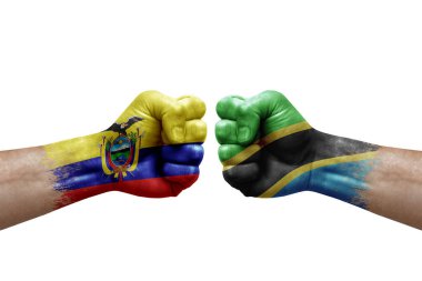 Two hands punch to each others on white background. Country flags painted fists, conflict crisis concept between ecuador and tanzania