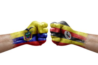 Two hands punch to each others on white background. Country flags painted fists, conflict crisis concept between ecuador and uganda