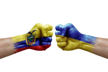 Two hands punch to each others on white background. Country flags painted fists, conflict crisis concept between ecuador and ukraine