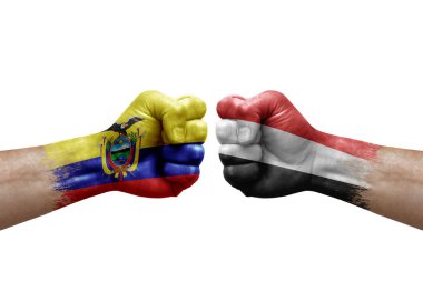 Two hands punch to each others on white background. Country flags painted fists, conflict crisis concept between ecuador and yemen