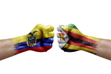 Two hands punch to each others on white background. Country flags painted fists, conflict crisis concept between ecuador and zimbabwe
