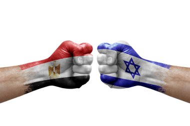 Two hands punch to each others on white background. Country flags painted fists, conflict crisis concept between egypt and israel