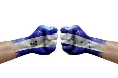 Two hands punch to each others on white background. Country flags painted fists, conflict crisis concept between el salvador and honduras