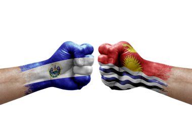 Two hands punch to each others on white background. Country flags painted fists, conflict crisis concept between el salvador and kiribati