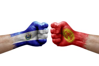 Two hands punch to each others on white background. Country flags painted fists, conflict crisis concept between el salvador and kyrgyzstan