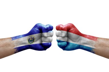 Two hands punch to each others on white background. Country flags painted fists, conflict crisis concept between el salvador and luxembourg