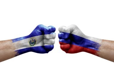Two hands punch to each others on white background. Country flags painted fists, conflict crisis concept between el salvador and russia
