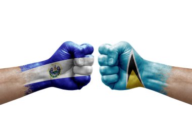 Two hands punch to each others on white background. Country flags painted fists, conflict crisis concept between el salvador and saint lucia