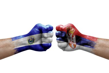 Two hands punch to each others on white background. Country flags painted fists, conflict crisis concept between el salvador and serbia