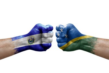 Two hands punch to each others on white background. Country flags painted fists, conflict crisis concept between el salvador and solomon islands