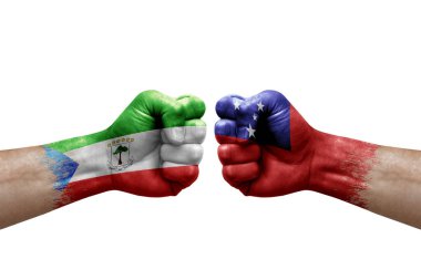 Two hands punch to each others on white background. Country flags painted fists, conflict crisis concept between equatorial guinea and samoa